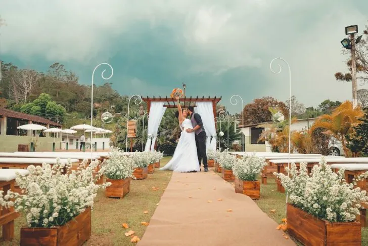 wedding couple first kiss