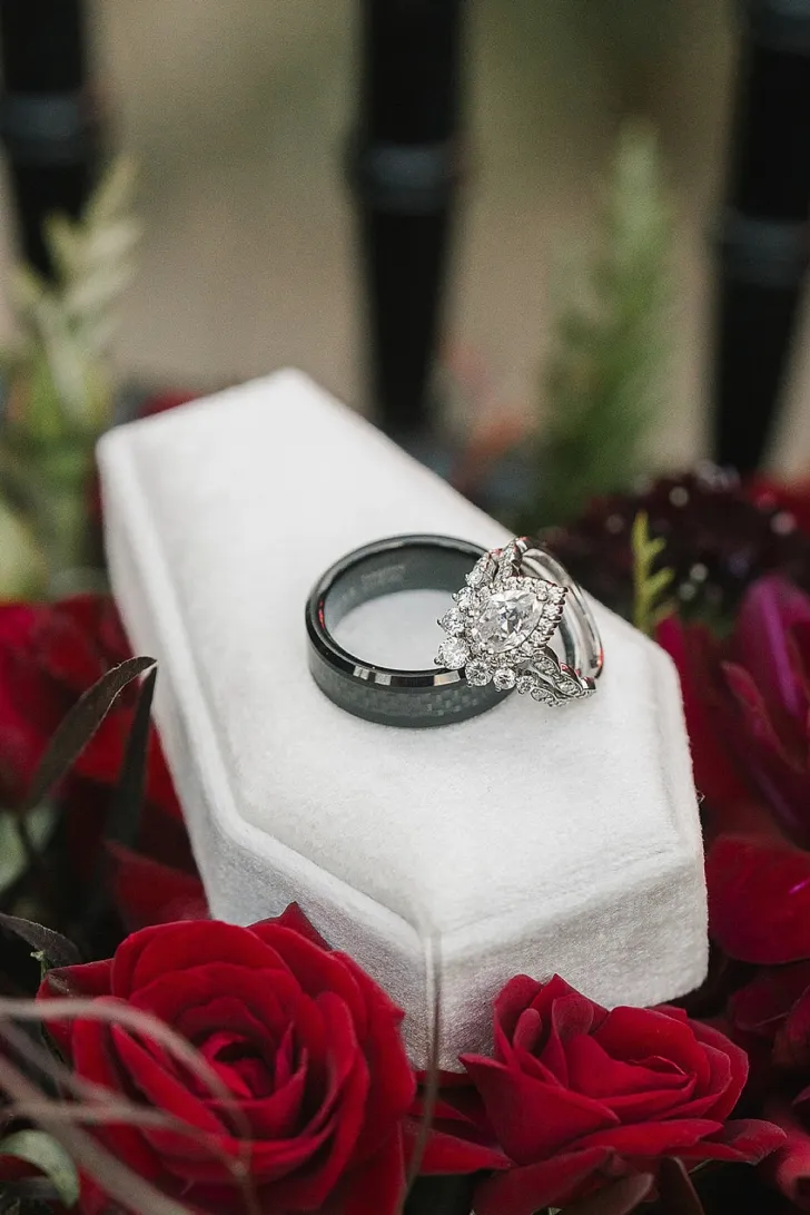 wedding ring on top of ring casket case