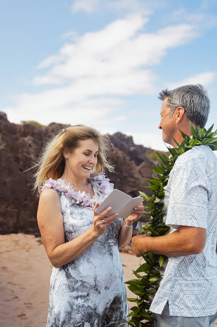 bride reading vows to groom