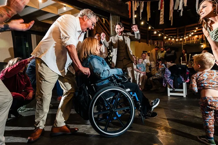 wedding guests dancing at the reception