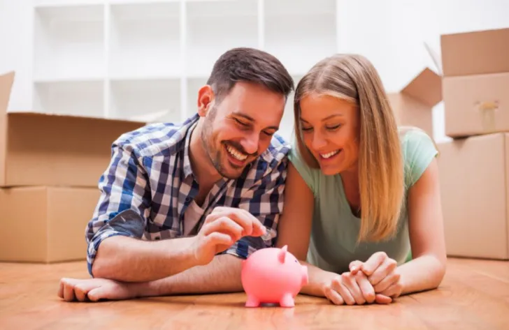 engaged couple saving money for wedding