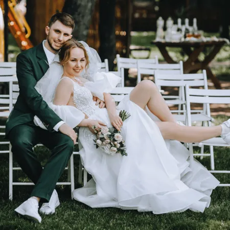 wedding budget averages debunked - happy couple at their wedding reception