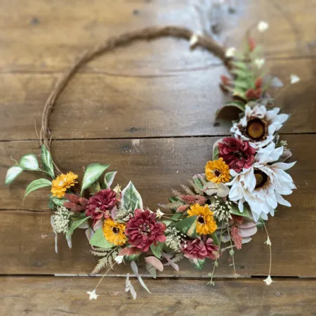 Learn how to make your own diy fall wreath with silk flowers for your home or wedding decor in this tutorial from Bloom Culture Flowers. 